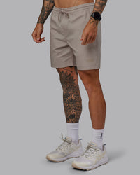 Man wearing Daily 7" Shorts - Shale Beige | Thumbnail Index: 5