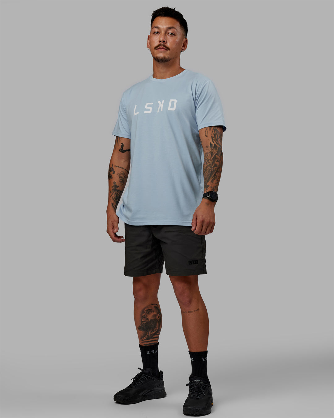 Man wearing 7&quot; Daily Shorts - Pirate Black | Model:Jemile | Size:M