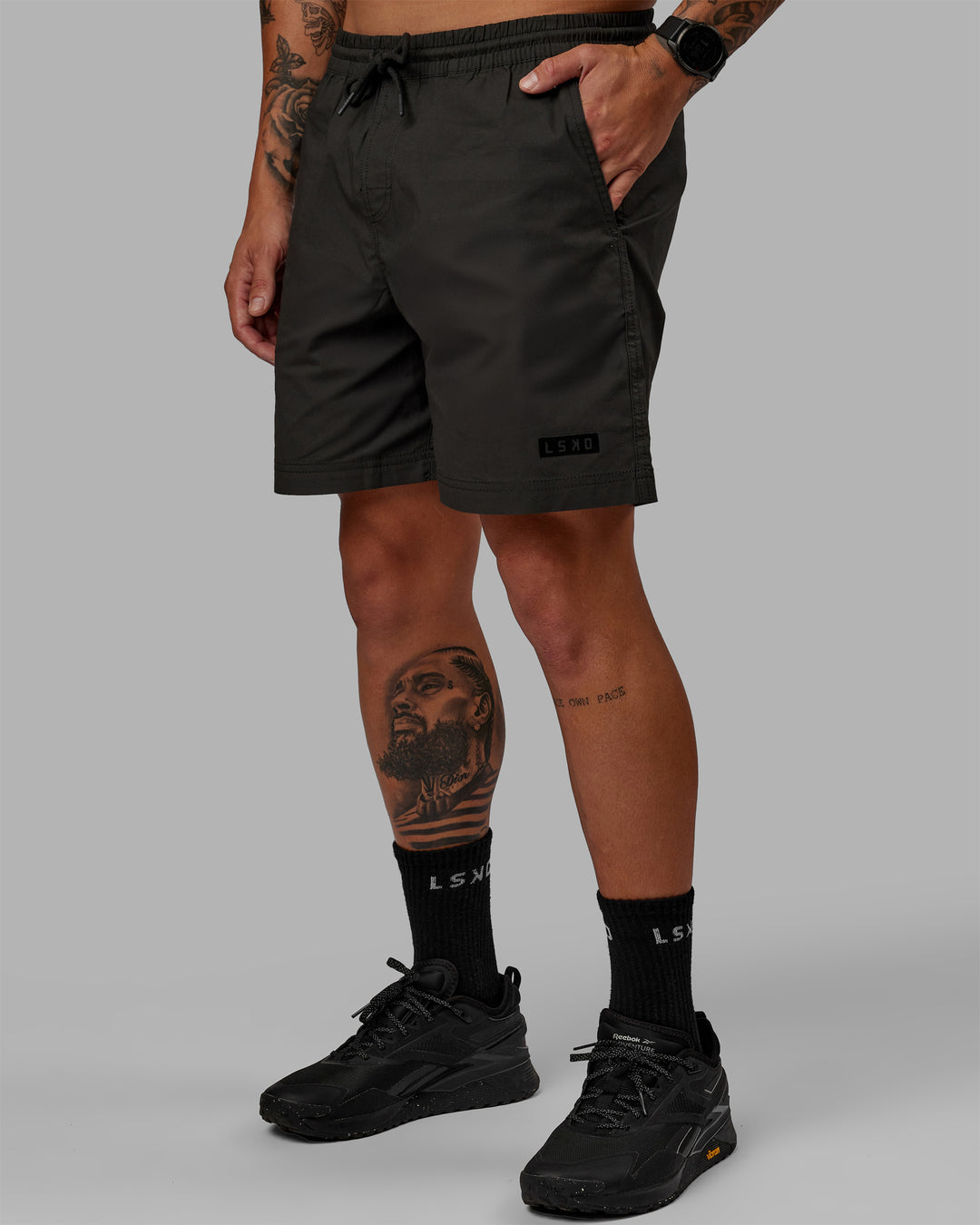 Man wearing 7&quot; Daily Shorts - Pirate Black | Model:Jemile | Size:M