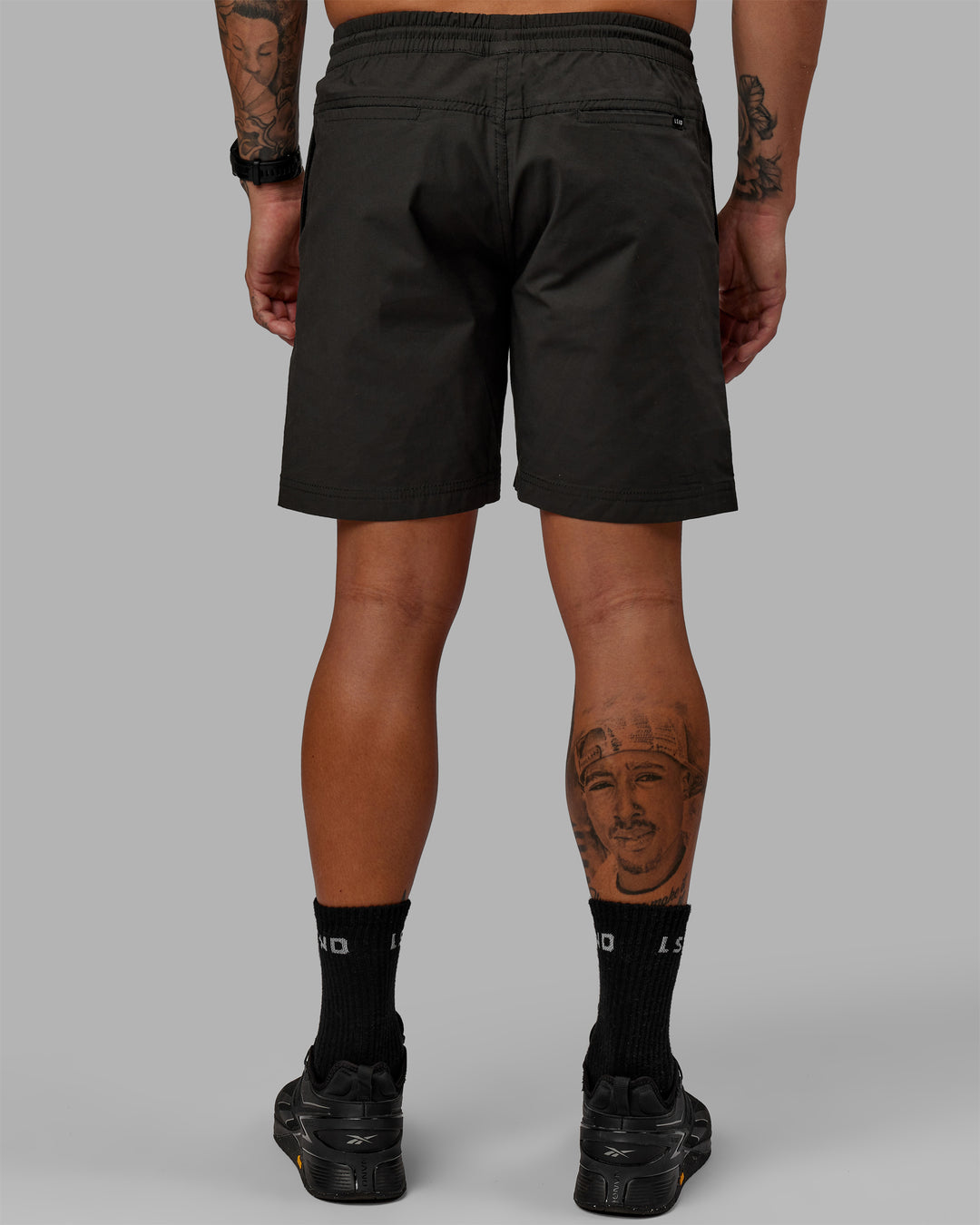 Man wearing 7&quot; Daily Shorts - Pirate Black | Model:Jemile | Size:M