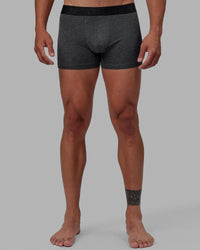 Man wearing daily trunks - dark grey.