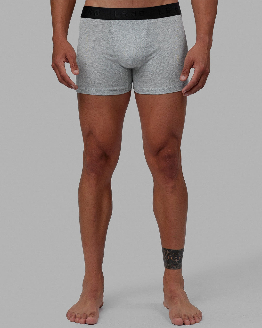 Man wearing daily trunks - light grey.