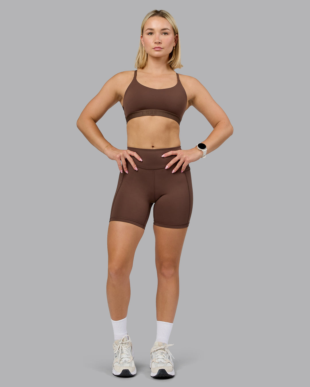Woman wearing Define Sports Bra - Chocolate Martini | Model:Halle | Size:S