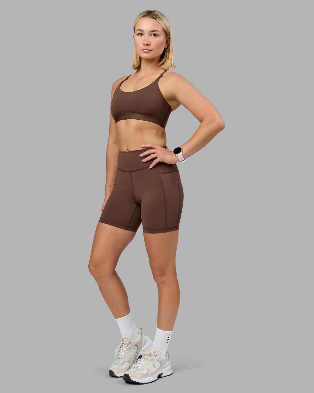 Woman wearing Define Sports Bra - Chocolate Martini | Model:Halle | Size:S
