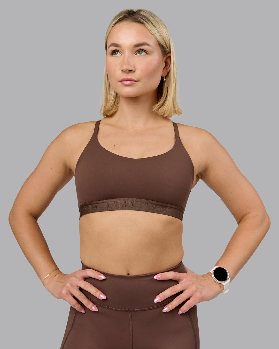 Woman wearing Define Sports Bra - Chocolate Martini | Model:Halle | Size:S