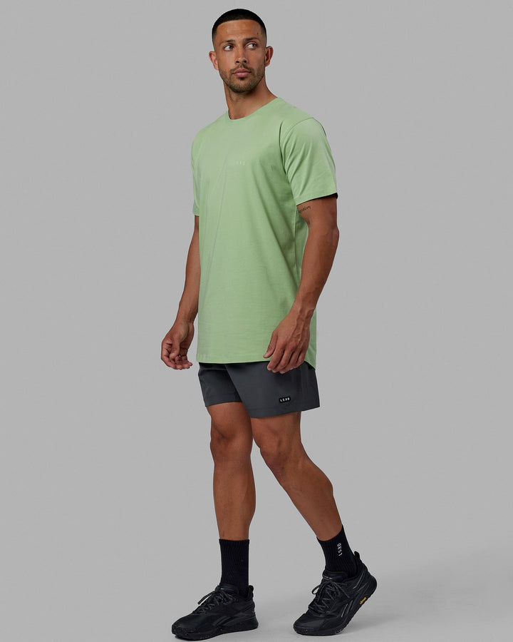 Man wearing Deluxe PimaFLX Tee - Green Fig