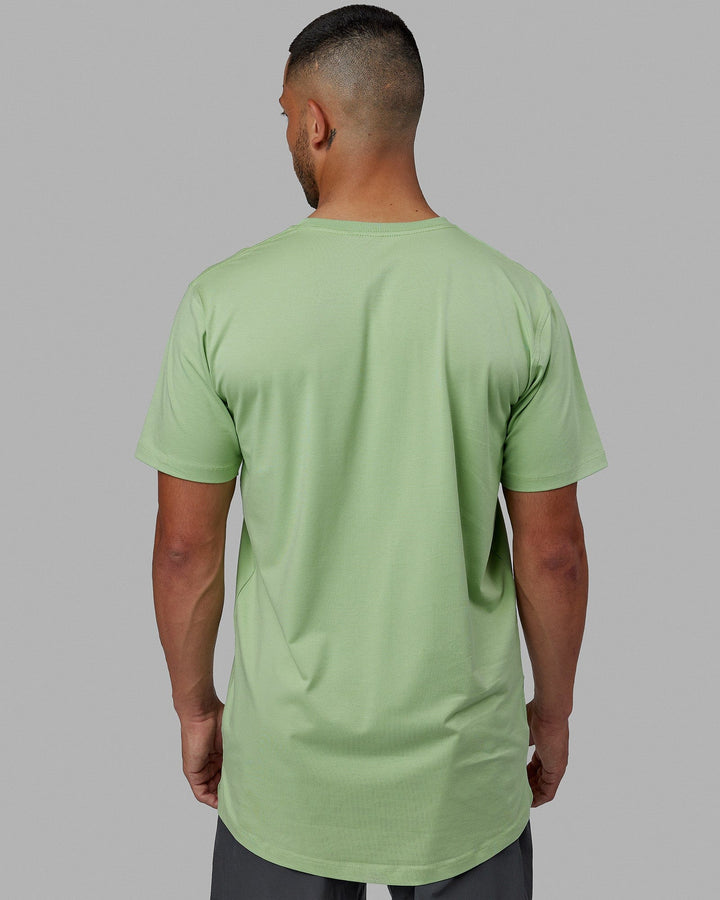 Man wearing Deluxe PimaFLX Tee - Green Fig