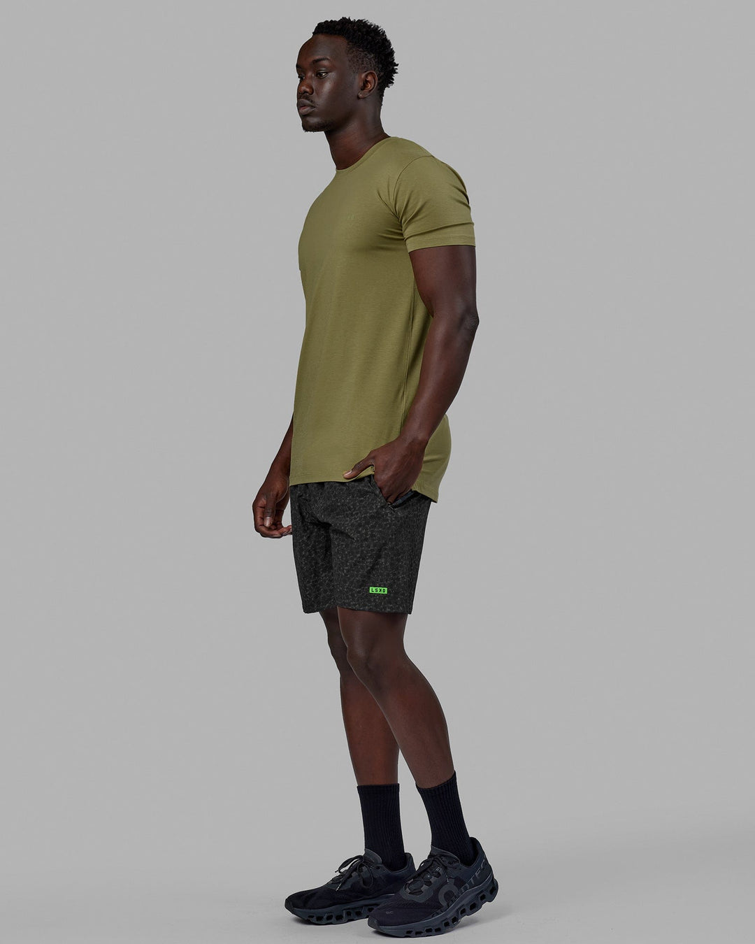 Man wearing Deluxe PimaFLX Tee - Moss Stone