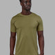 Man wearing Deluxe PimaFLX Tee - Moss Stone