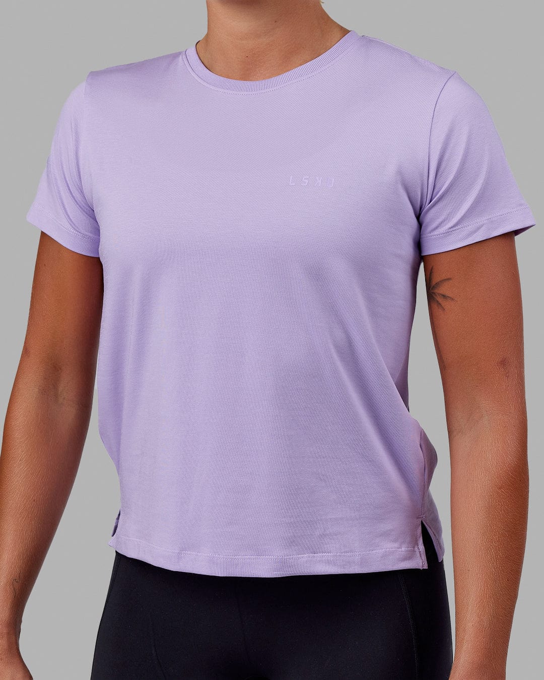 Woman wearing Deluxe PimaFLX Tee - Pale Lilac