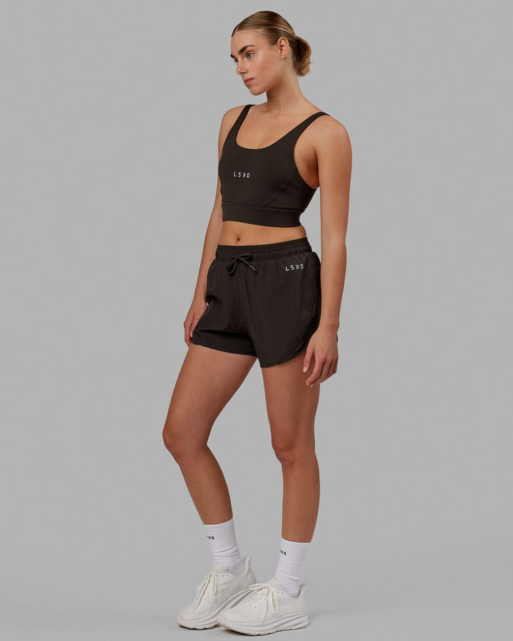 Woman wearing Dynamic Run Short - Dark Walnut
