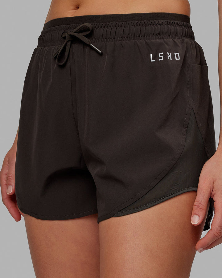 Woman wearing Dynamic Run Short - Dark Walnut