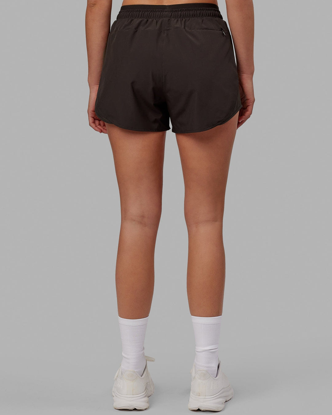 Woman wearing Dynamic Run Short - Dark Walnut