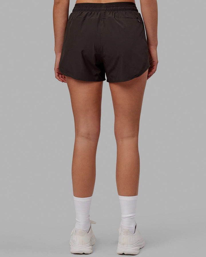 Woman wearing Dynamic Run Short - Dark Walnut