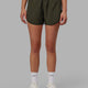 Woman wearing Dynamic Run Short - Forest Night