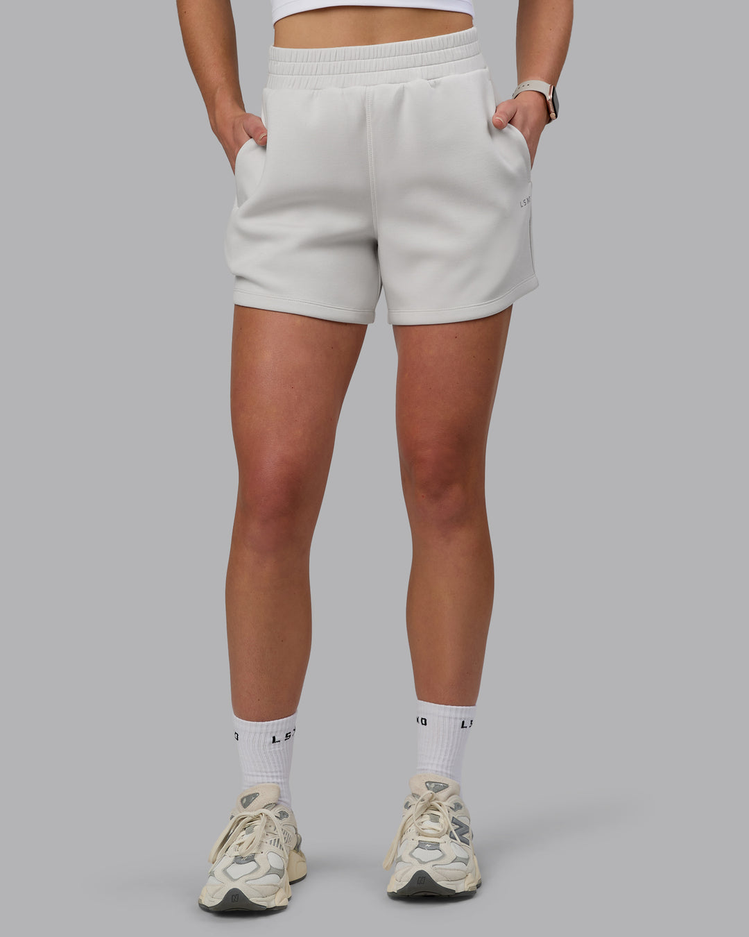 Woman wearing Elevate SoftTouch 4&quot; Shorts - Clay-Clay