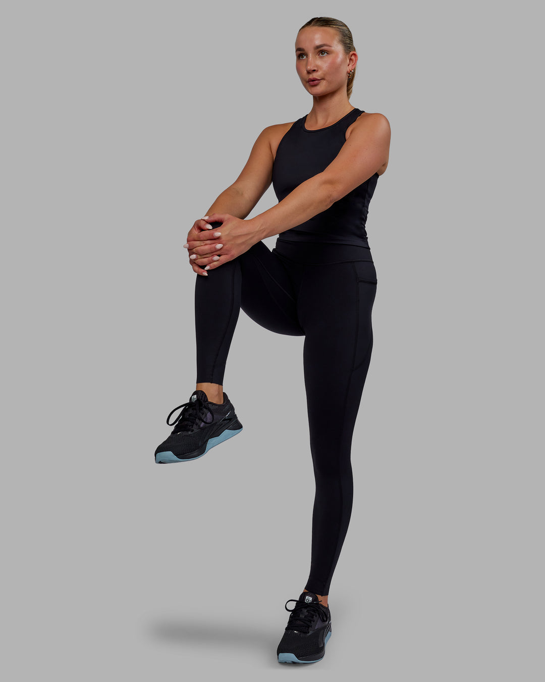 Woman wearing Elite High-Rise Full Length Legging Pockets - Black