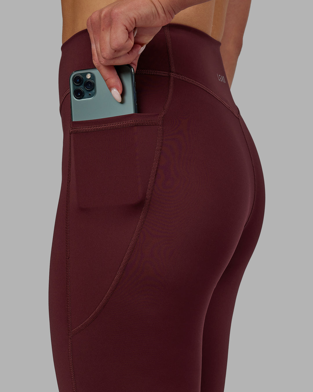 Woman wearing Elite High-Rise Full Length Legging Pockets - Dark Cherry