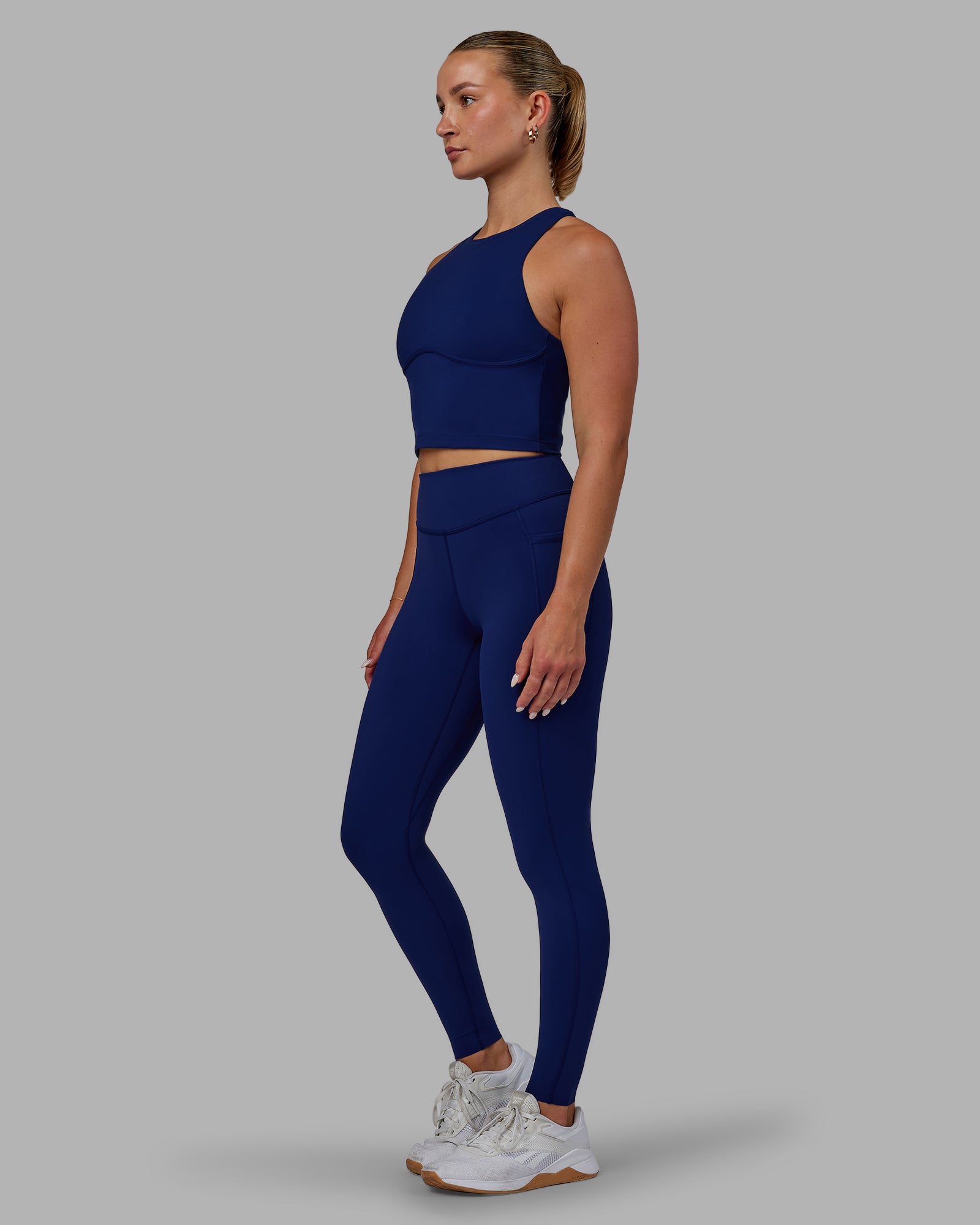 Woman wearing Elite High-Rise Full Length Legging Pockets - Midnight Blue