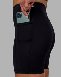 Woman wearing Elite High-Rise 6" Short Pockets - Black