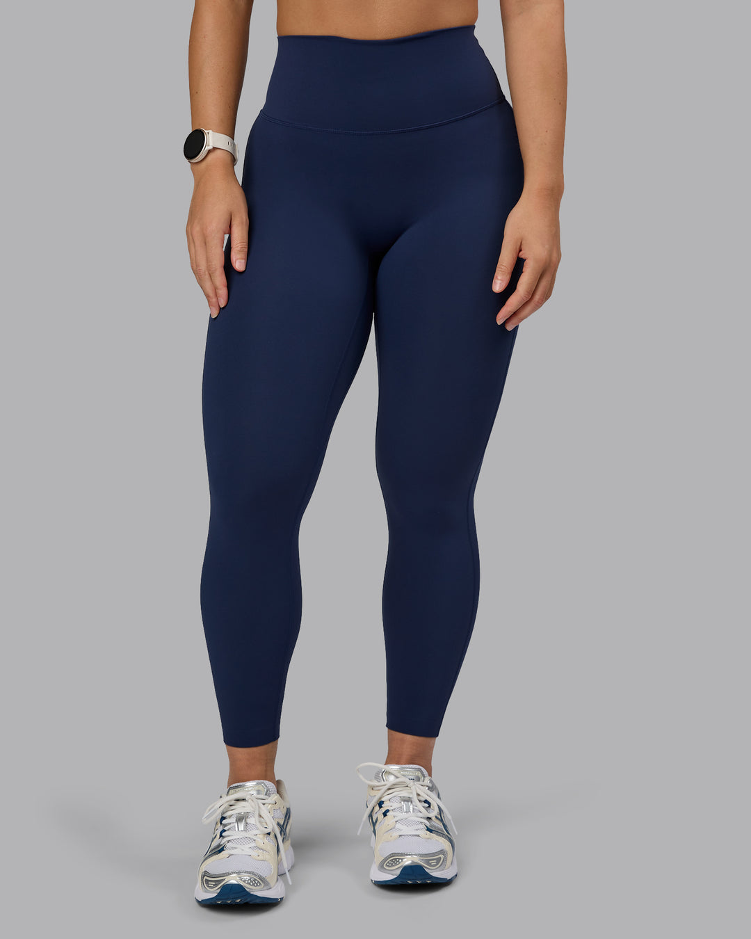 Woman wearing Elixir Ultra High-Rise 7/8 Legging - Future Navy | Model:Lyss | Size:S