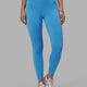 Woman wearing Elixir 7/8 Tights With Pockets - Azure Blue