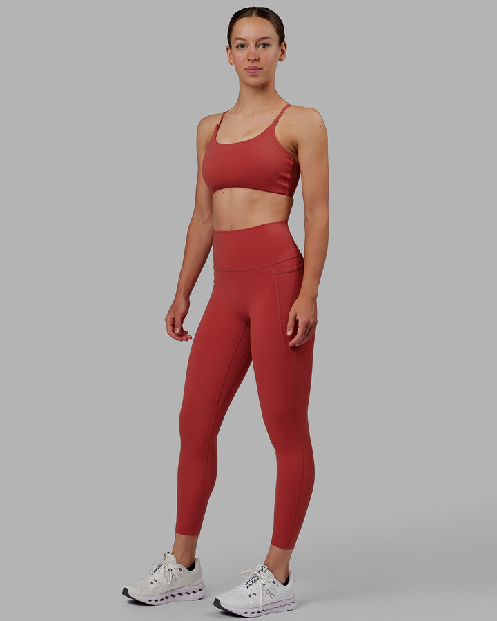 Woman wearing Elixir 7/8 Length Tights With Pockets - Cardinal