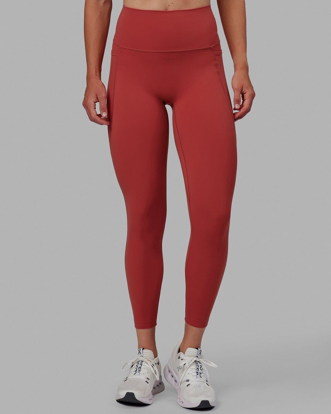 Woman wearing Elixir 7/8 Length Tights With Pockets - Cardinal