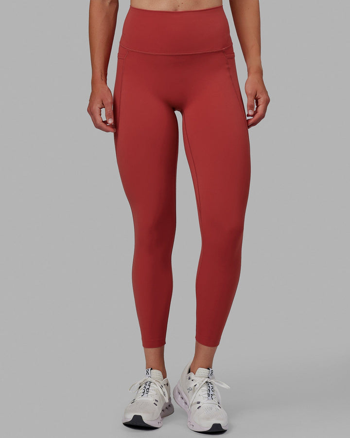 Woman wearing Elixir 7/8 Length Tights With Pockets - Cardinal
