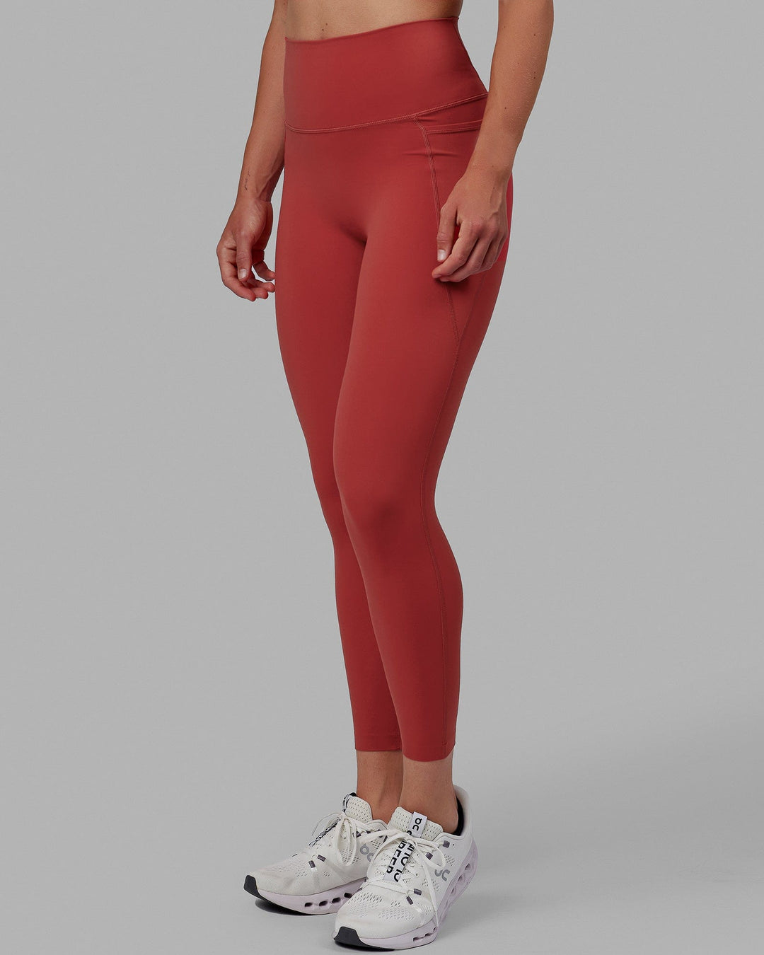 Woman wearing Elixir 7/8 Length Tights With Pockets - Cardinal