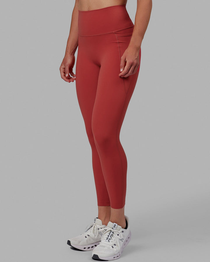 Woman wearing Elixir 7/8 Length Tights With Pockets - Cardinal