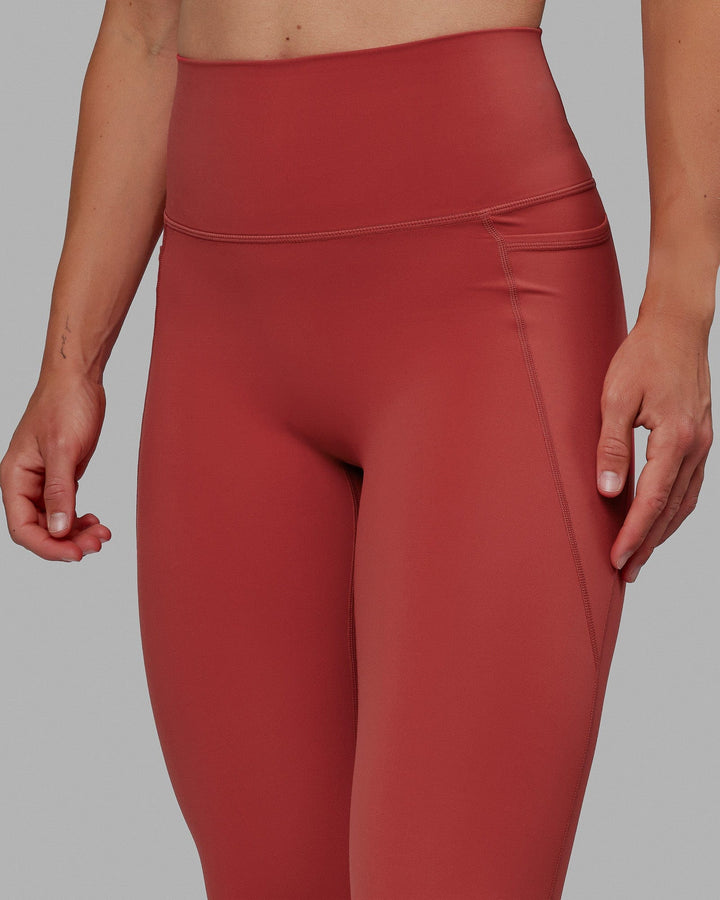 Woman wearing Elixir 7/8 Length Tights With Pockets - Cardinal