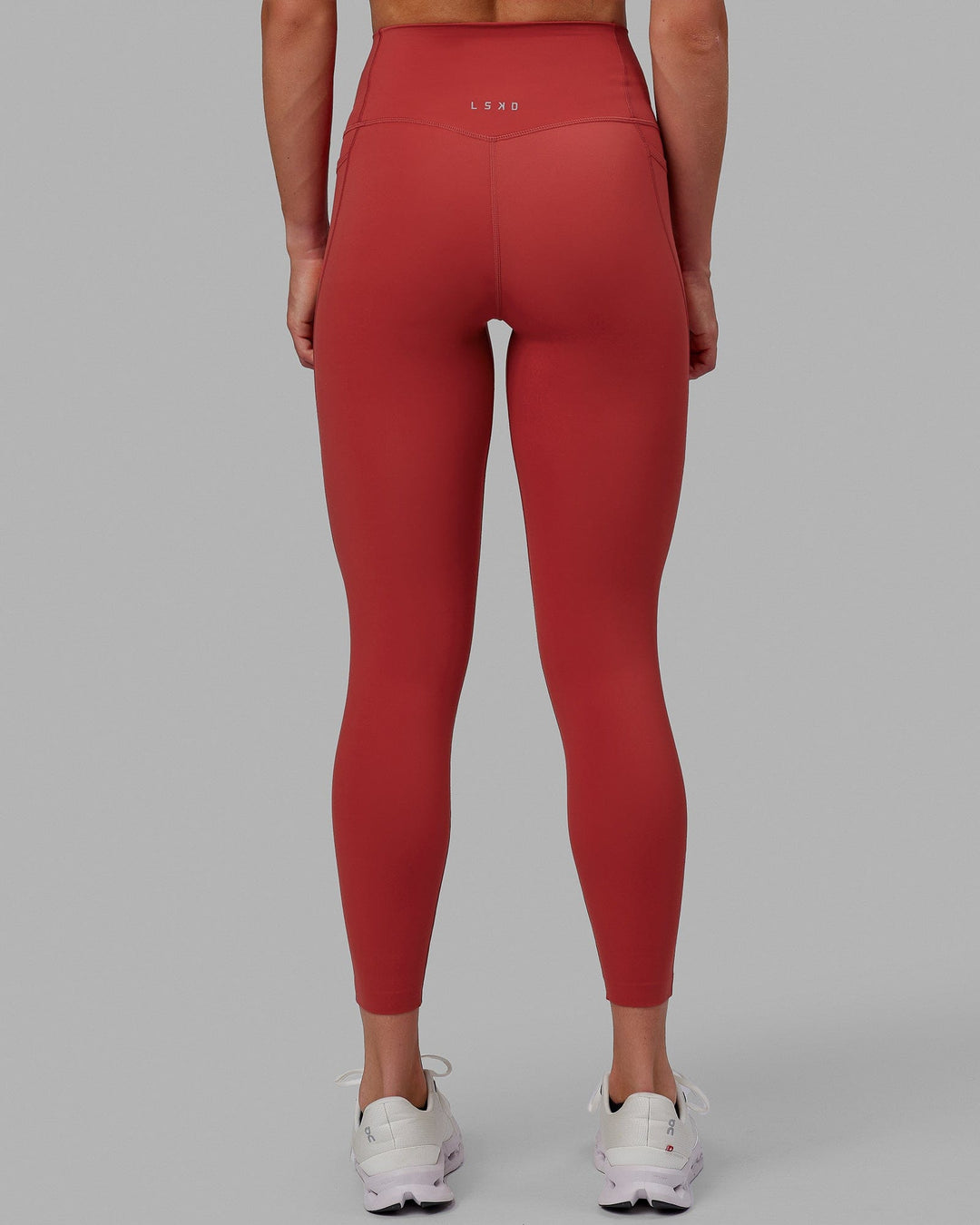 Woman wearing Elixir 7/8 Length Tights With Pockets - Cardinal