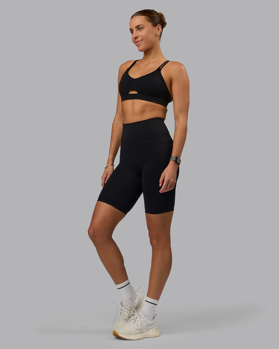 Woman wearing Elixir Ultra High-Rise 9&quot; Short Pockets - Black | Model:Shae | Size:S