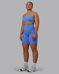 Woman wearing Elixir Ultra High-Rise 9" Short Pockets - Ultramarine | Model:Bronty | Size:M