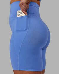 Woman wearing Elixir Ultra High-Rise 9" Short Pockets - Ultramarine | Model:Bronty | Size:M