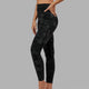 Woman wearing Elixir Full Length Tight - Black Camo