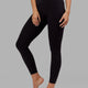 Woman wearing Elixir Full Length Tight - Black No Logo