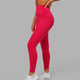 Woman wearing Elixir Full Length Tight - Boysenberry No Logo