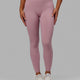 Woman wearing Elixir Full Length Tights - Cosmetic Pink