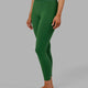 Woman wearing Elixir Full Length Tight - Eden Green No Logo
