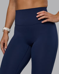Woman wearing Elixir Ultra High-Rise Full Length Legging - Future Navy