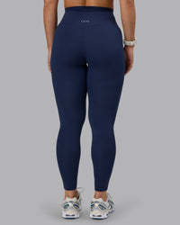 Woman wearing Elixir Ultra High-Rise Full Length Legging - Future Navy