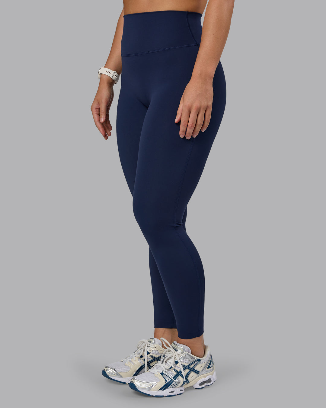 Woman wearing Elixir Ultra High-Rise Full Length Legging - Future Navy