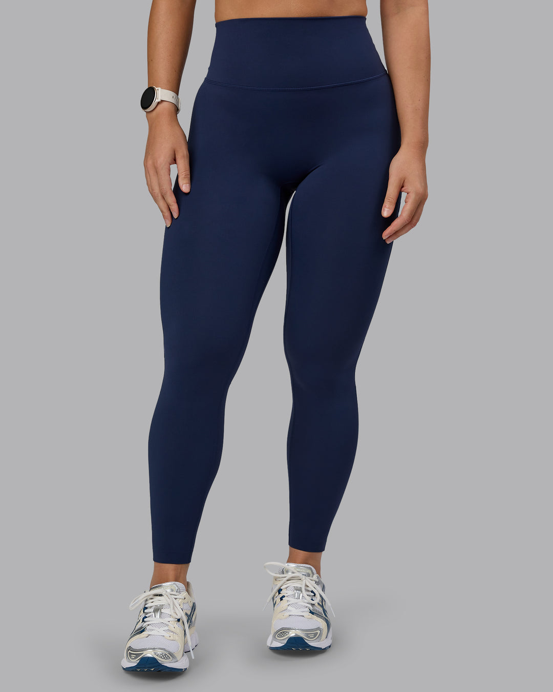 Woman wearing Elixir Ultra High-Rise Full Length Legging - Future Navy