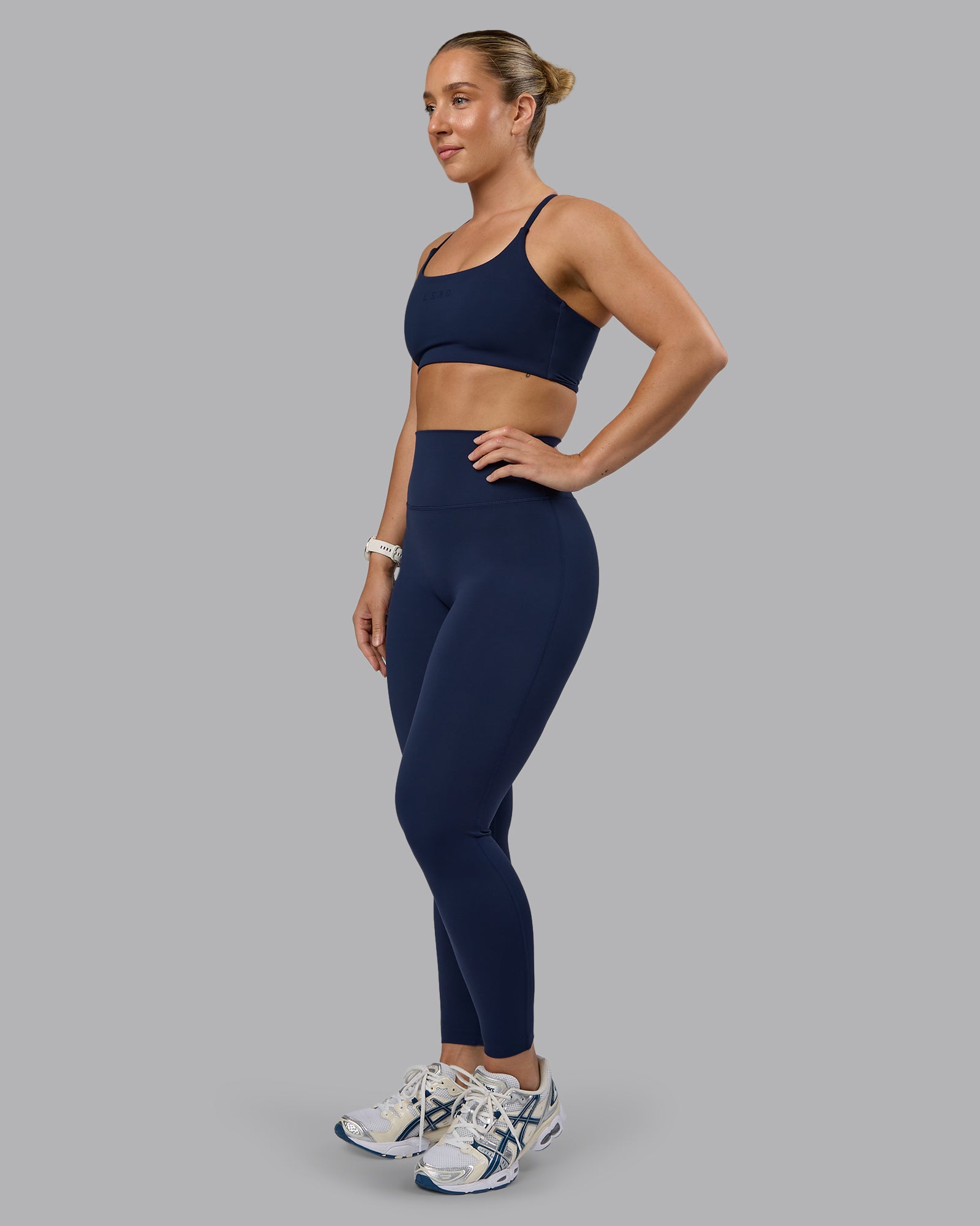Woman wearing Elixir Ultra High-Rise Full Length Legging - Future Navy