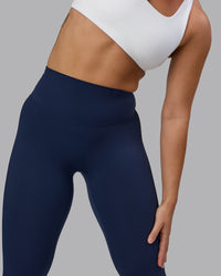 Woman wearing Elixir Ultra High-Rise Full Length Legging - Future Navy