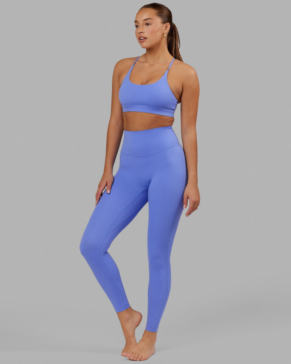 Woman wearing Elixir Full Length Tight - Indulgent Blue