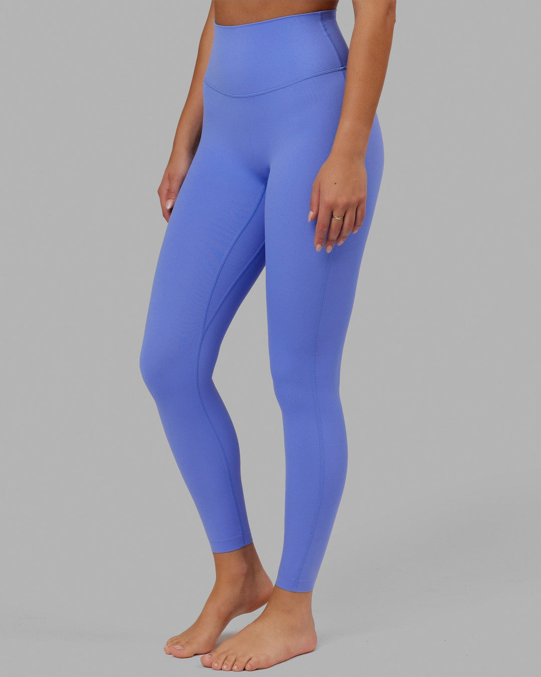 Woman wearing Elixir Full Length Tight - Indulgent Blue