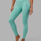 Woman wearing Elixir Full Length Tight - Nile Blue No Logo